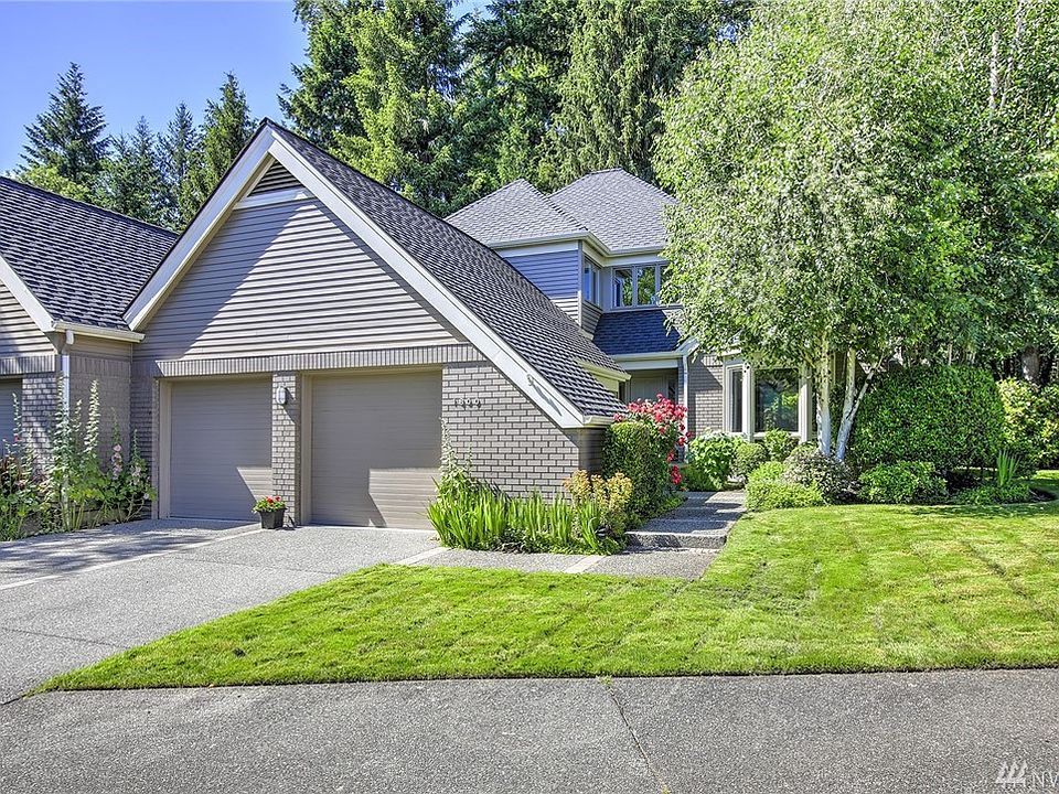 Spacious 2 car garage and driveway. Landscaping maintained by the HOA including sprinkler system. 