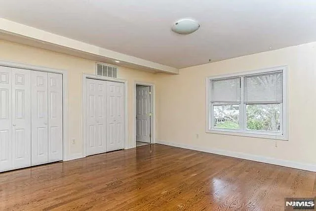 Primary bedroom with 2 closets