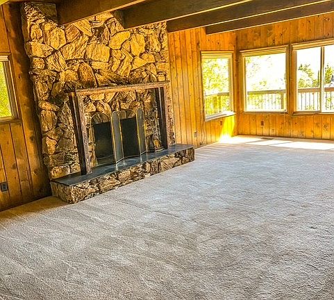 Spacious living room on middle level. Cozy fireplace with great views.