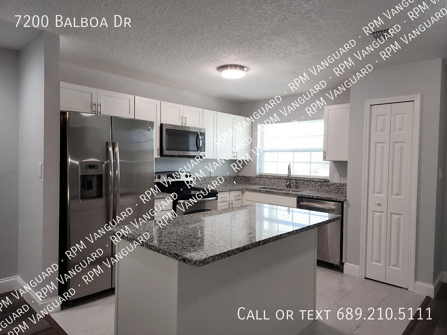 Ground Floor End Unit Condo with Open Floor Plan and Screened Patio; Water Included — Photo 2