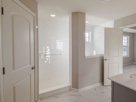 Fully-Tiled, Walk-In Owner's Shower