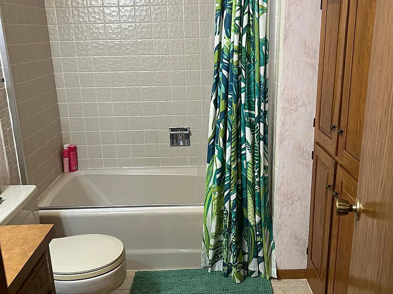 Main Bath. Note generous storage on right