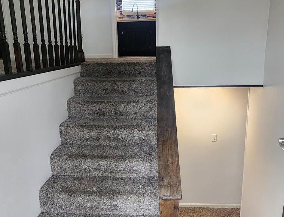 Standing at front door entry