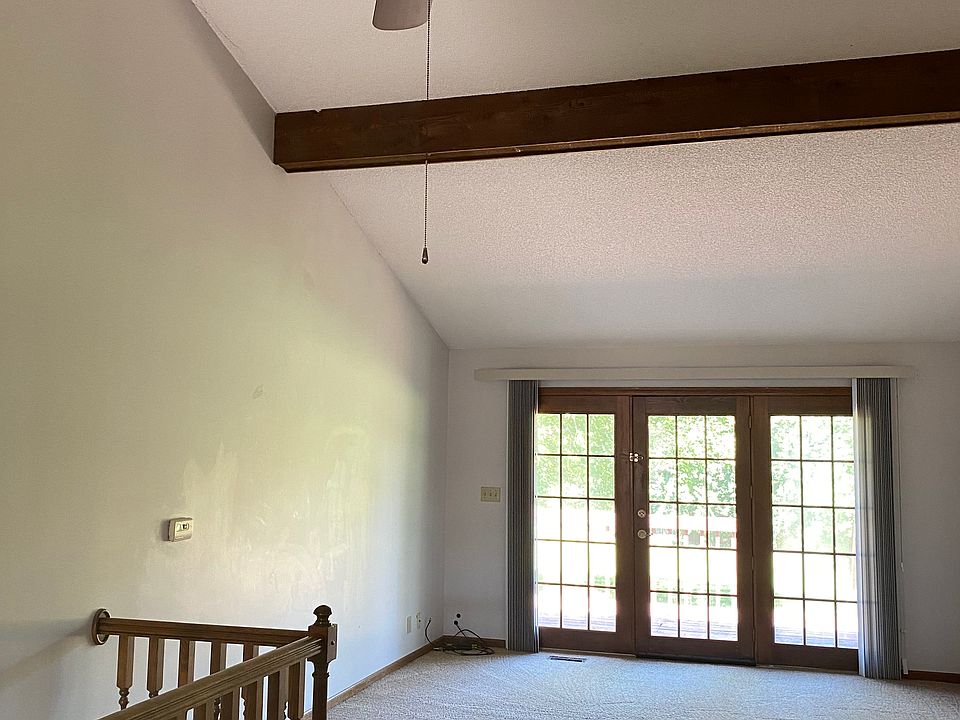 Great room looking north to deck and large green space