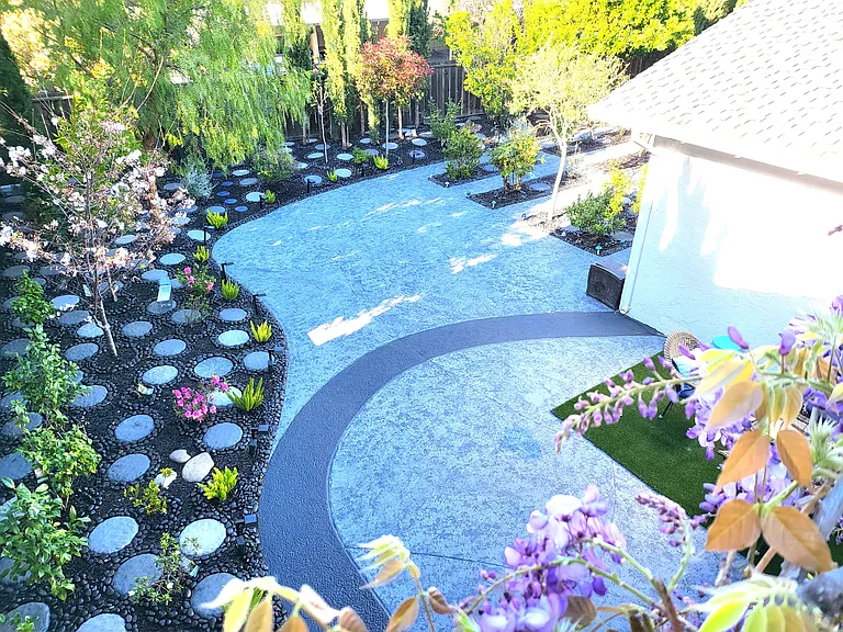 Balcony view overlooking beautiful backyard.