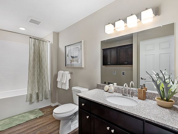 Two Beautiful Bathrooms with Lots of Storage