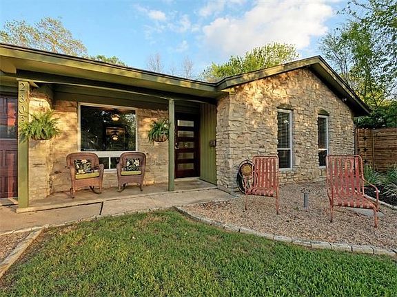 Welcoming porch and front sitting area.