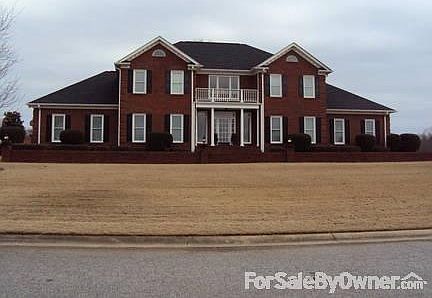 Home sits on large lot
						:
						First house when entering golf course. Backs up to # 9 green.