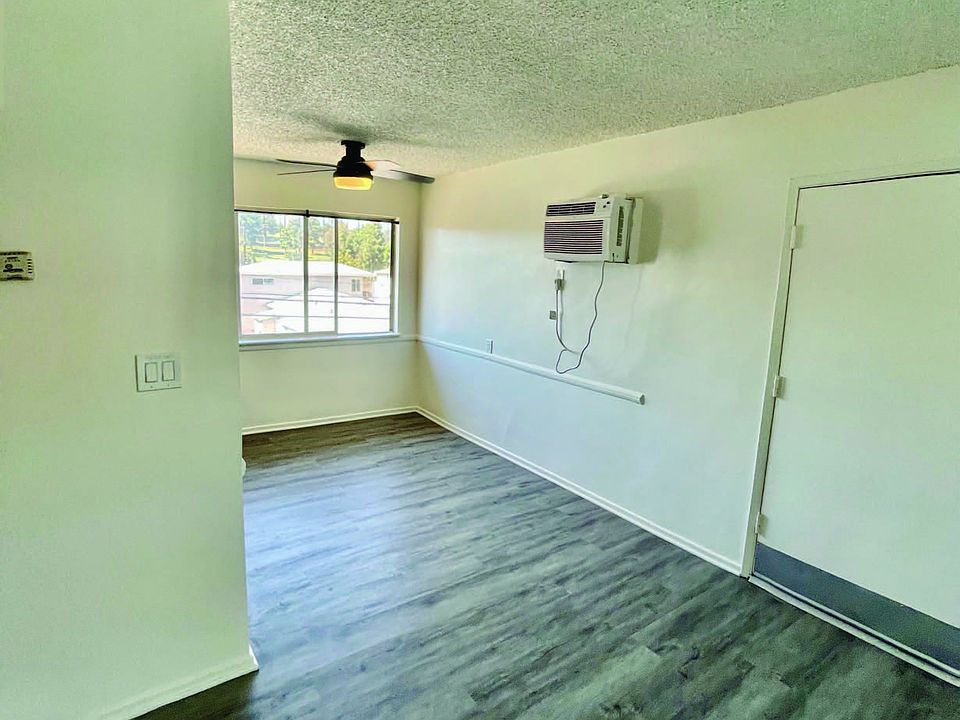Large dining area and living room. Newly painted, hardwood floors for easy cleaning. New air condition unit to cool large rooms.