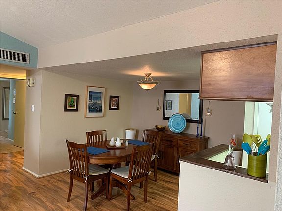 Adorable formal dining area. Can't you just imagine having a lovely candlelight dinner here?