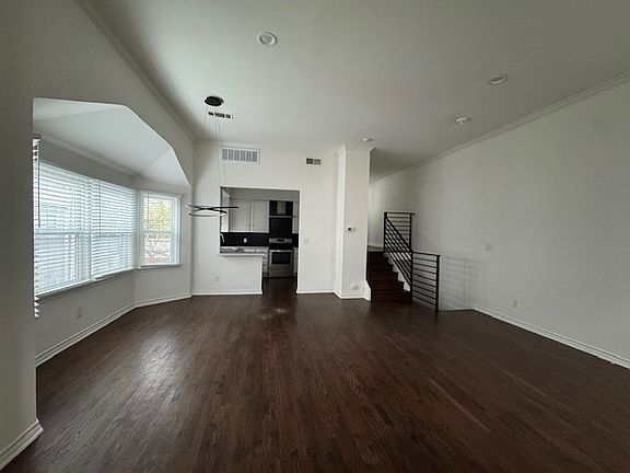 Living room into Dining and Kitchen and side loft