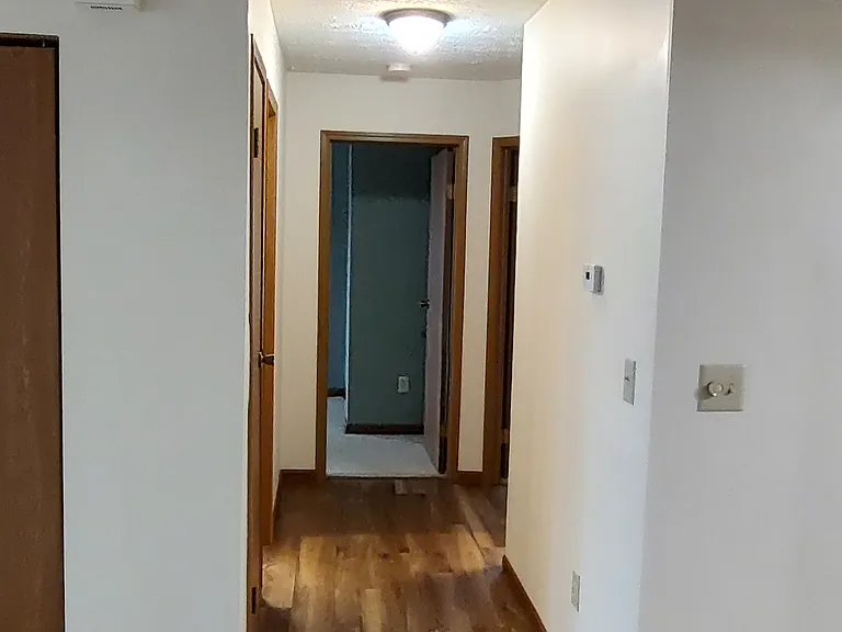 Hallway to bedrooms and baths