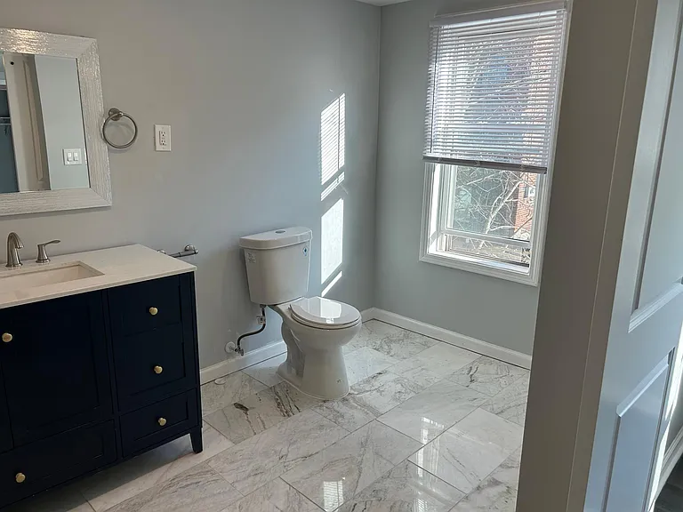 119 Pius St — Photo 15