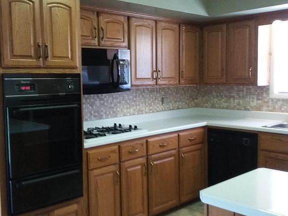 kitchen --oven wall-- gas stove-- microwave