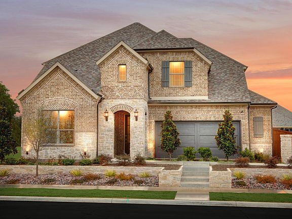 New home with brick and stone exterior