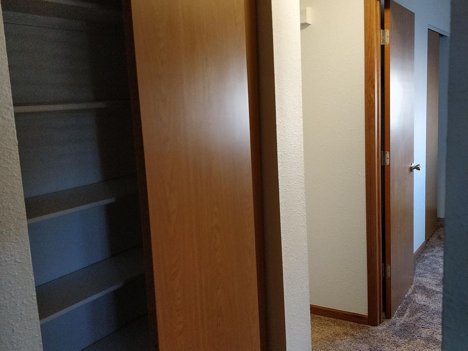 Hallway from living room to bed/bathroom with closet LEFT.