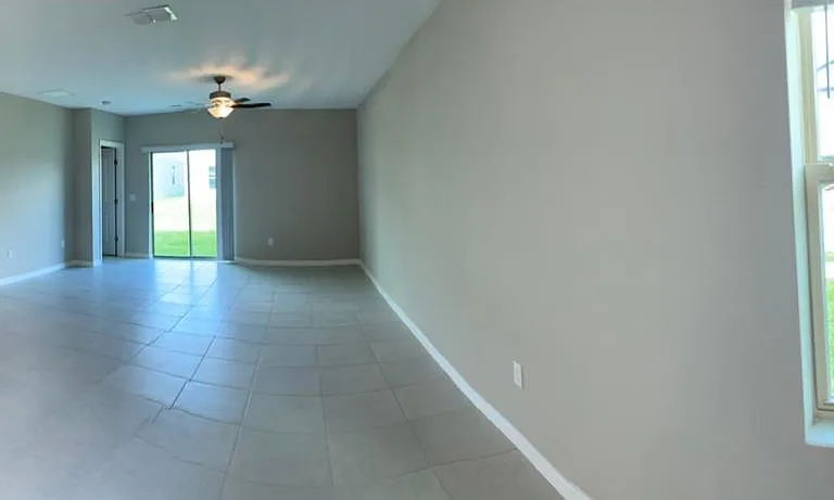 Open floor plan with lots of natural lighting