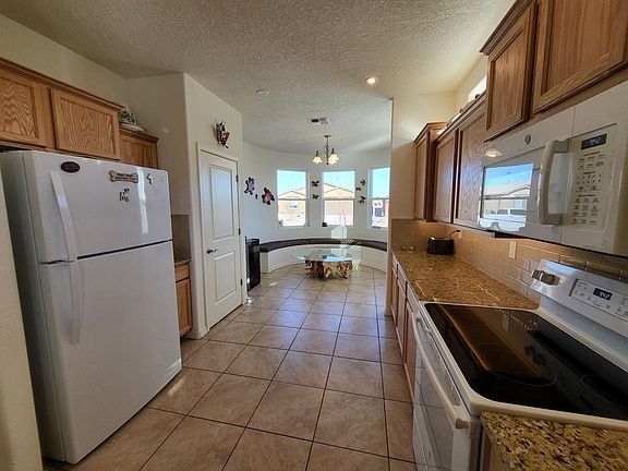 3rd image of 3973 N Mora River Ave SW