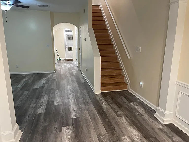 Front door/family room/stairs leading upstairs