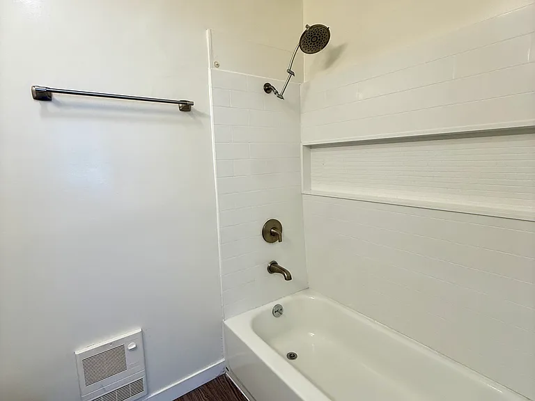 Combo bathtub and shower.
