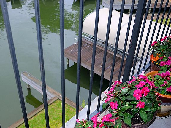 Waterfront home in the gated community of Pebble Glen on Lake Conroe. Easy access to I-45 makes for 