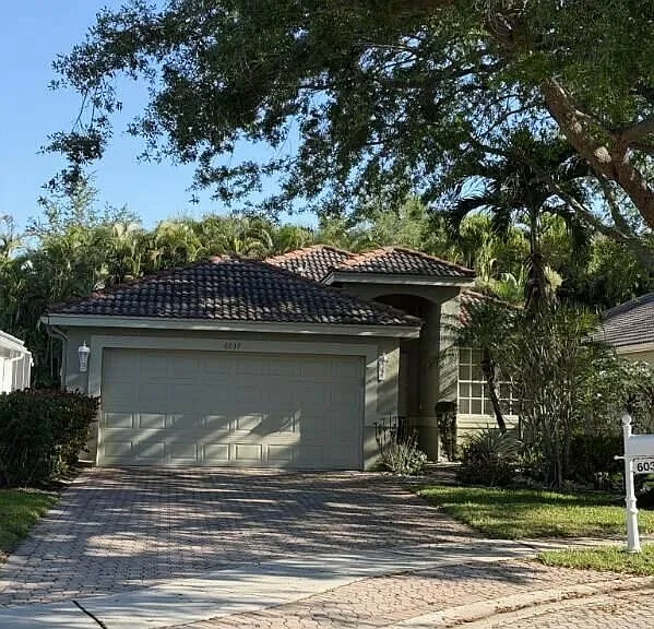 6037 Rossmoor Lakes Ct — Photo 1
