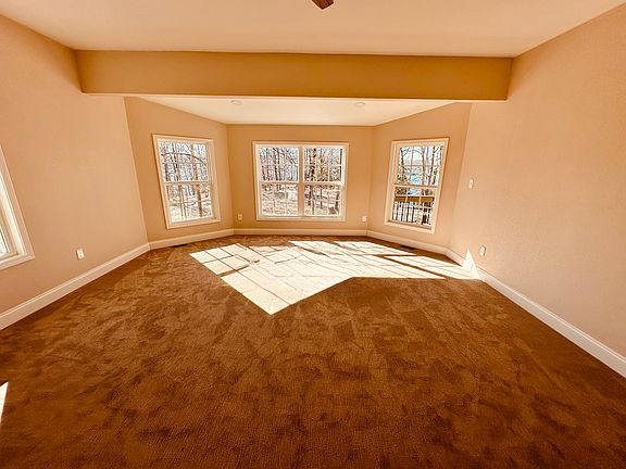 Master bedroom with retreat. Season lake views, view of the woods and the wildlife.
