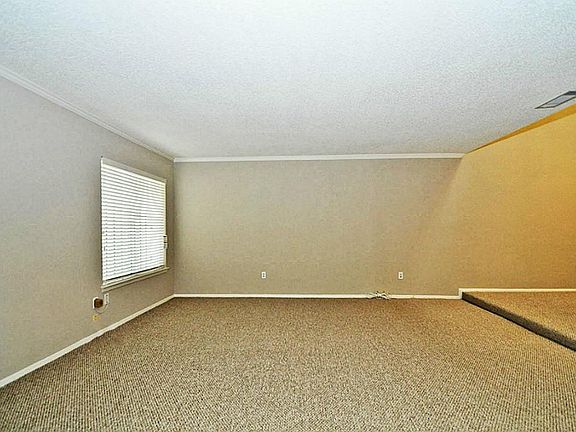 Plenty of room here- no doubt about it! Carpet throughout the unit is new as of November, 2012, as are blinds throught the home.