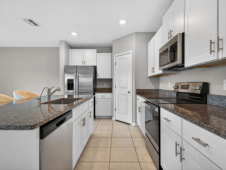 9909 Calypso Orchid Ct — Photo 45