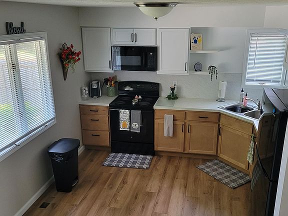 All new kitchen....cabinets, tops, appliances and flooring