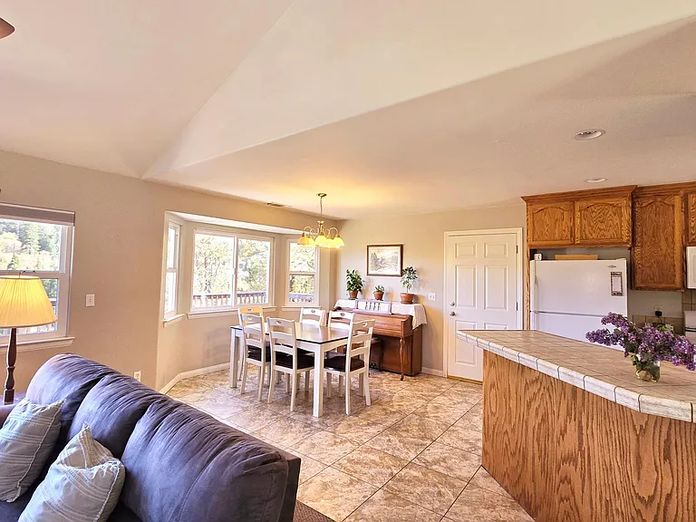 the living room leads to the upper deck