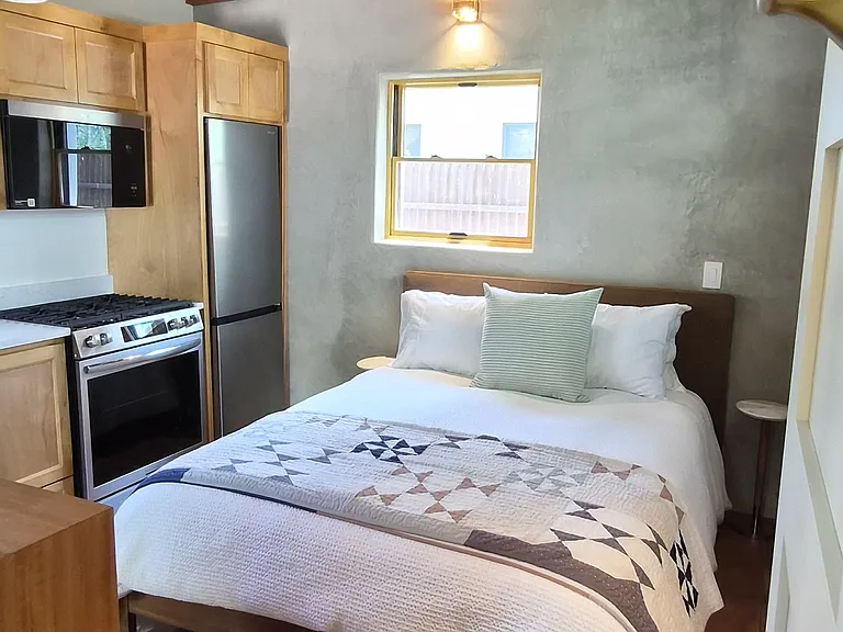 plush Queen bed featuring a Leesa Oasis Chill Hybrid mattress