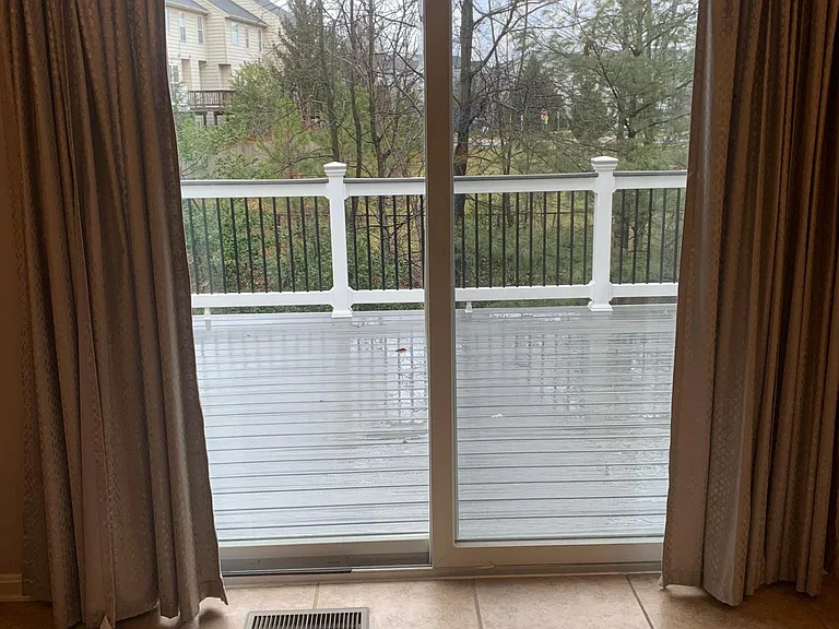 Deck view from dining room on a rainy day