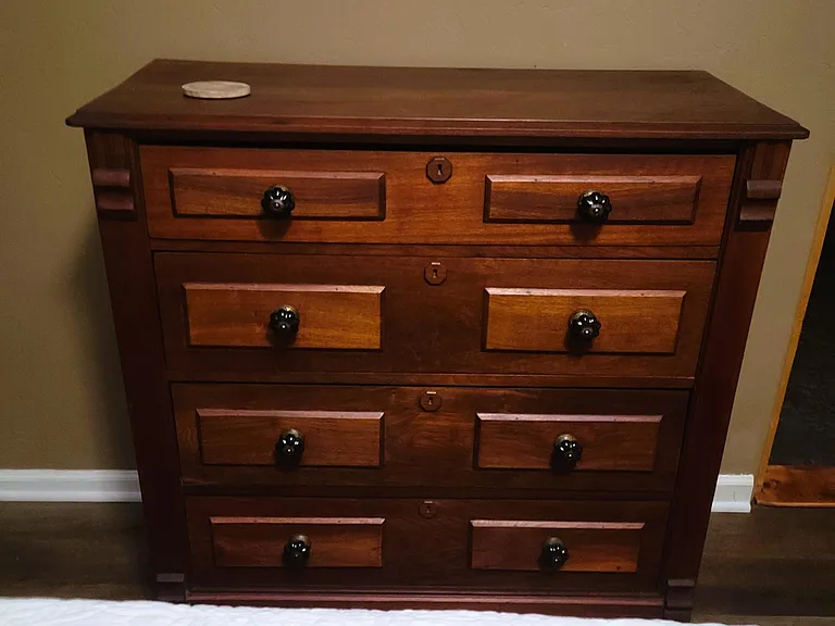 Refinished antique dresser in Master.