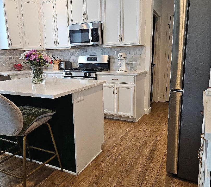 Kitchen with stainless steel appliances