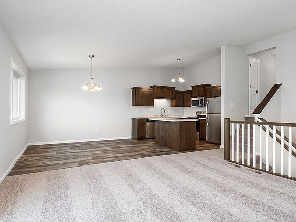 You and your guests will enjoy the open-concept layout of the kitchen, dining room and great room.