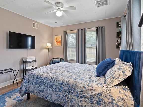 Watch TV while you fall asleep or read using bedside lamps