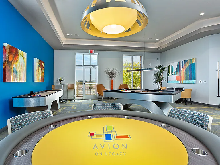 Game room with billiards and shuffle board
