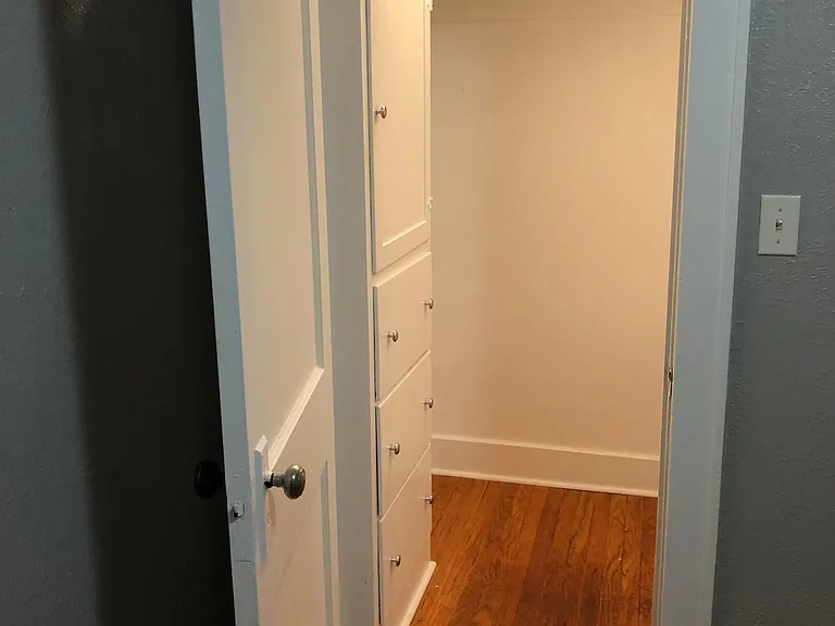 Walk In Closet w/ built in storage.