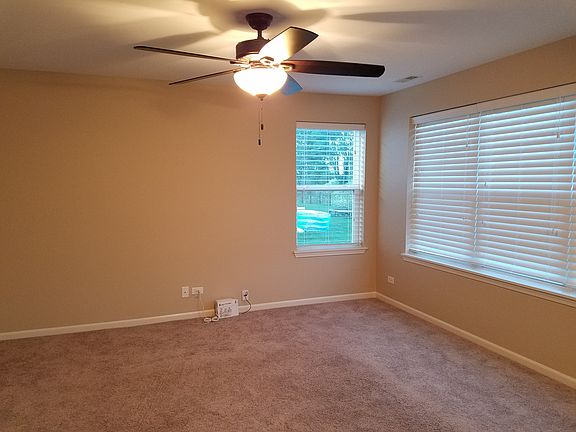 Family room with ceiling fan
