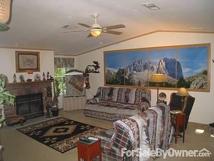 Greatroom : Spacious greatroom with wood-burning fireplace and cathedral ceilings