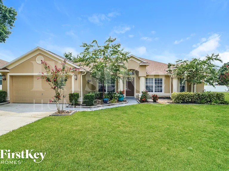 13219 Lakewind Dr — Photo 1