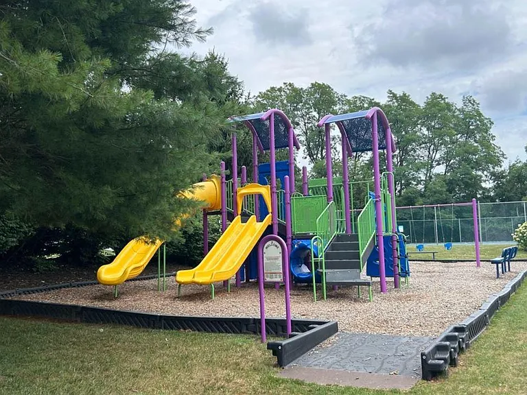 Newly redone playground that is practically in your backyard