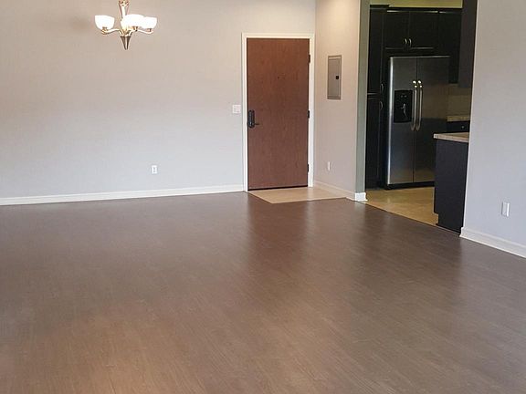 View from the Living Room to Front Entry and Open Kitchen