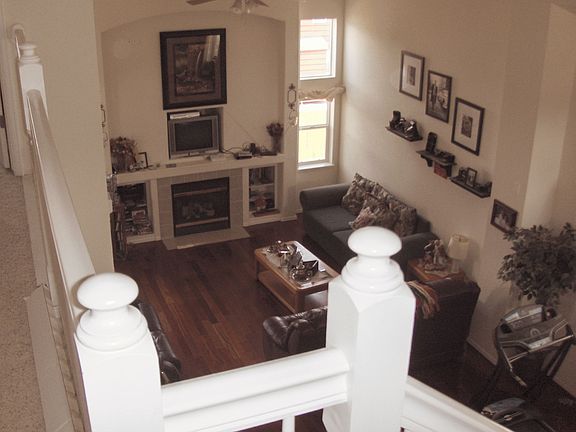 Second floor hallway looks down into the great roo