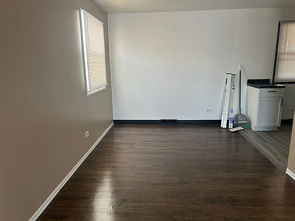 Living room Dining room combo with refinished floors