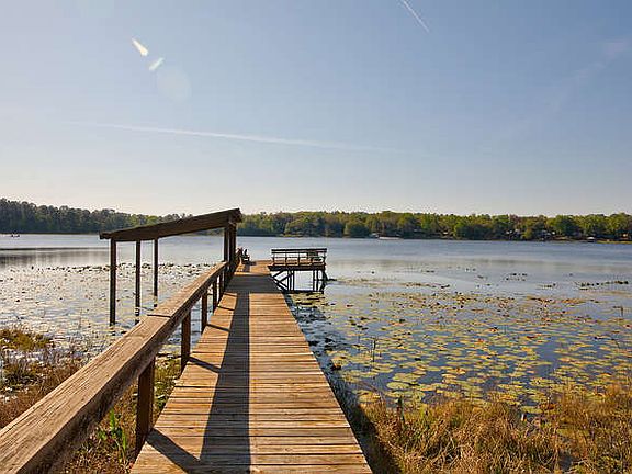 Private dock with covered boat slip.