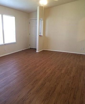 Living Room. Vinyl plank flooring. Easy to clean and care for.
