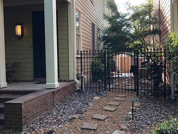 Side view of house with yard