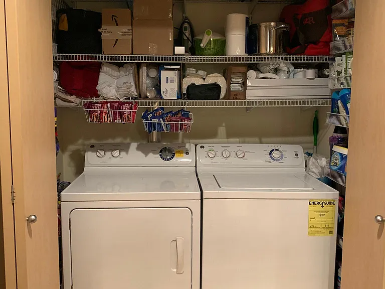 In unit full size washer/dryer and lots of storage